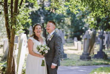 A happy couple in the churchyard